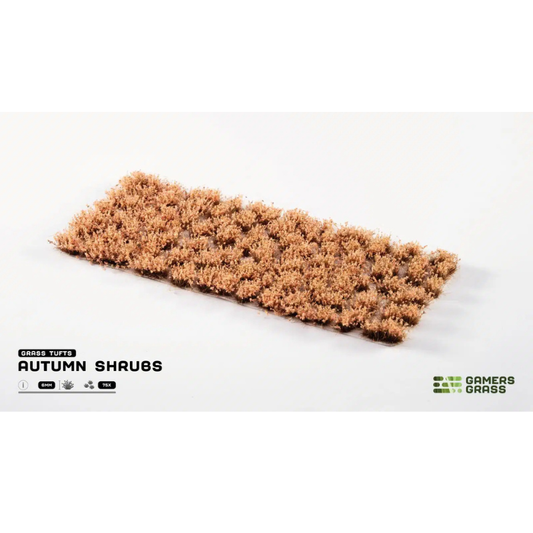 Autumn Shrubs 6mm Gamers Grass - arkusz 75 żółto-brązowych kępek krzewów jesiennych na białym tle z logo Gamers Grass i oznaczeniem 6mm 75x