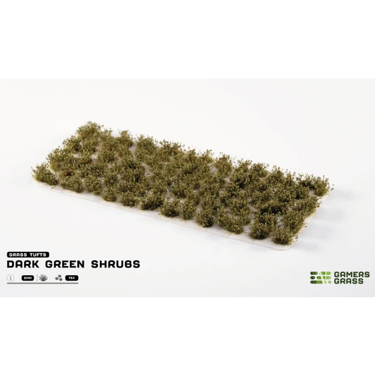Dark Green Shrubs 6mm Gamers Grass - arkusz ciemnozielonych kępek krzewów na białym tle z logo Gamers Grass i opisem produktu: Grass Tufts 6mm 75x
