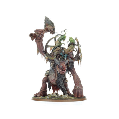 Trugg the Troggoth King Gloomspite Gitz - widok z przodu brązowo-szary troll maczuga ze ślimakiem w prawej ręce zielony artefakt na plecach poroże czaszki owalna podstawka Age of Sigmar