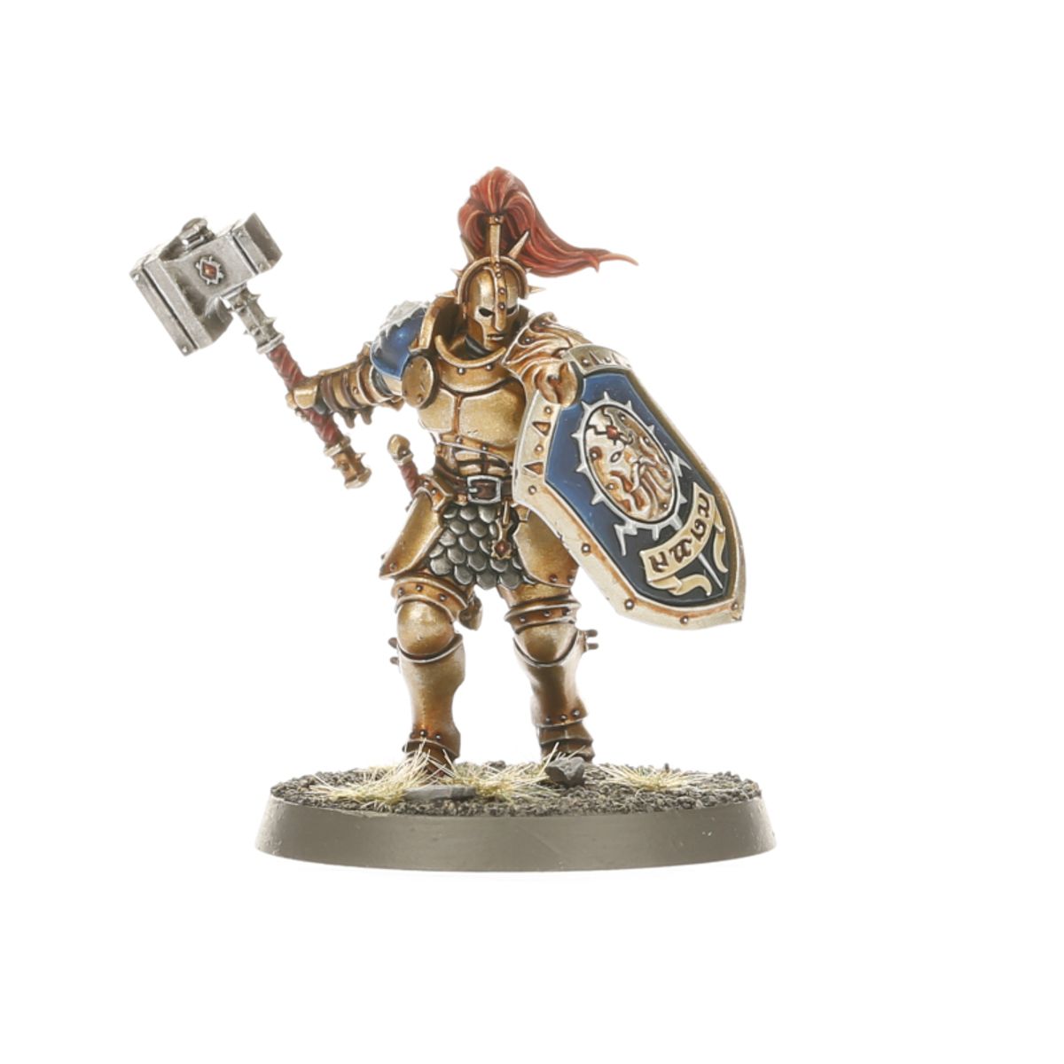 Liberator-Prime z czerwonym pióropuszem - Stormcast Eternal w złotej zbroi z niebieską tarczą z herbem Sigmara i złotym napisem, unosi warhammer w prawej ręce - Warhammer Age of Sigmar