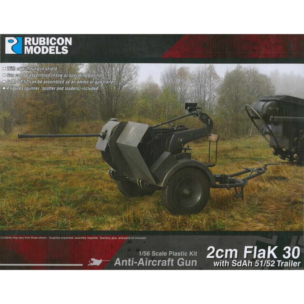 2cm FlaK 30 z przyczepą SdAh 51/52 – przód pudełka Rubicon Models 280109: model działa przeciwlotniczego w pozycji holowanej na tle łąki, skala 1/56