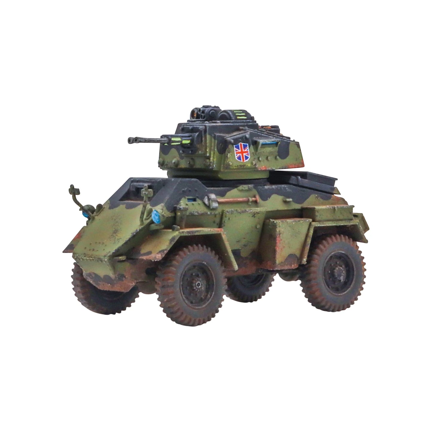 Konflikt '47 British Commonwealth Starter Army 452600603 – Humber Mk VII Armoured Car w kamuflażu oliwkowo-czarnym, widok z przodu lewej strony: bliźniacze działka automatyczne w wieży, flaga Union Jack na boku wieży, niebieskie elementy systemu auto-obliczeniowego, 6 kół, 28mm Warlord Games
