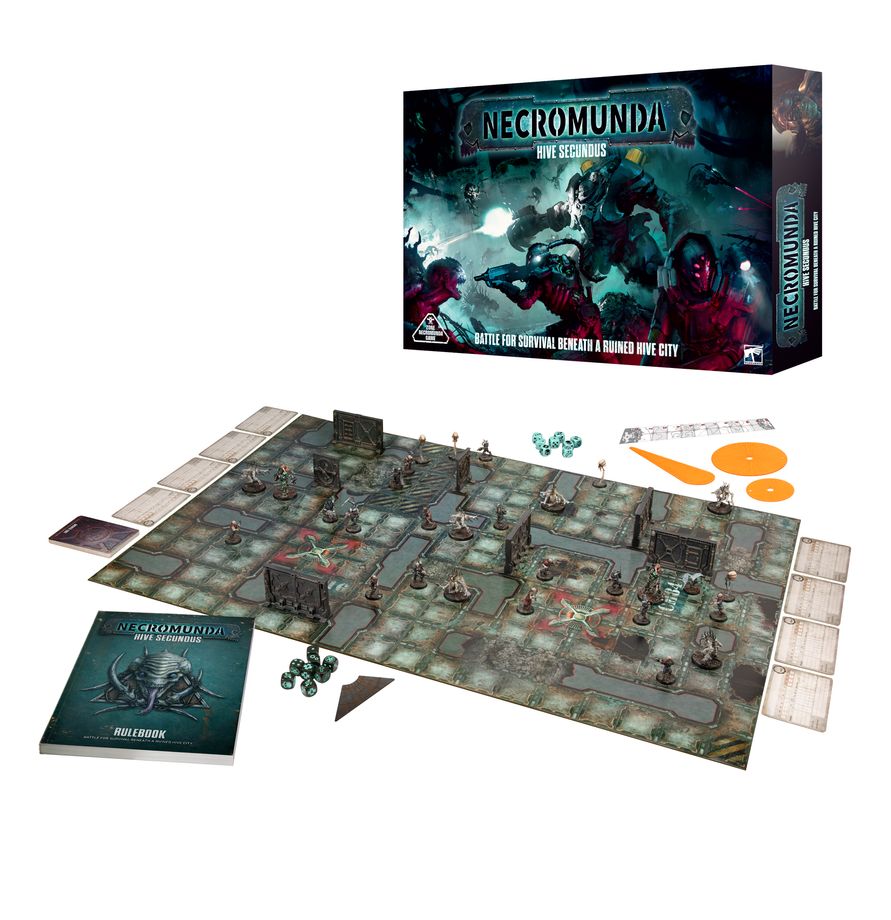 Hive Secundus - pudełko Necromunda i rozłożona zawartość mata do gry z figurkami i terenem podręcznik Rulebook karty żetony i pomarańczowe szablony ognia Necromunda Games Workshop