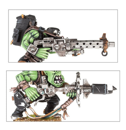 Ork Boyz - plansza 2 kadry: Boy z big shoota długa szara lufa z otworami czarny plecak; Boy z rokkit launcha zielona skóra otwarte usta Orks Warhammer 40000