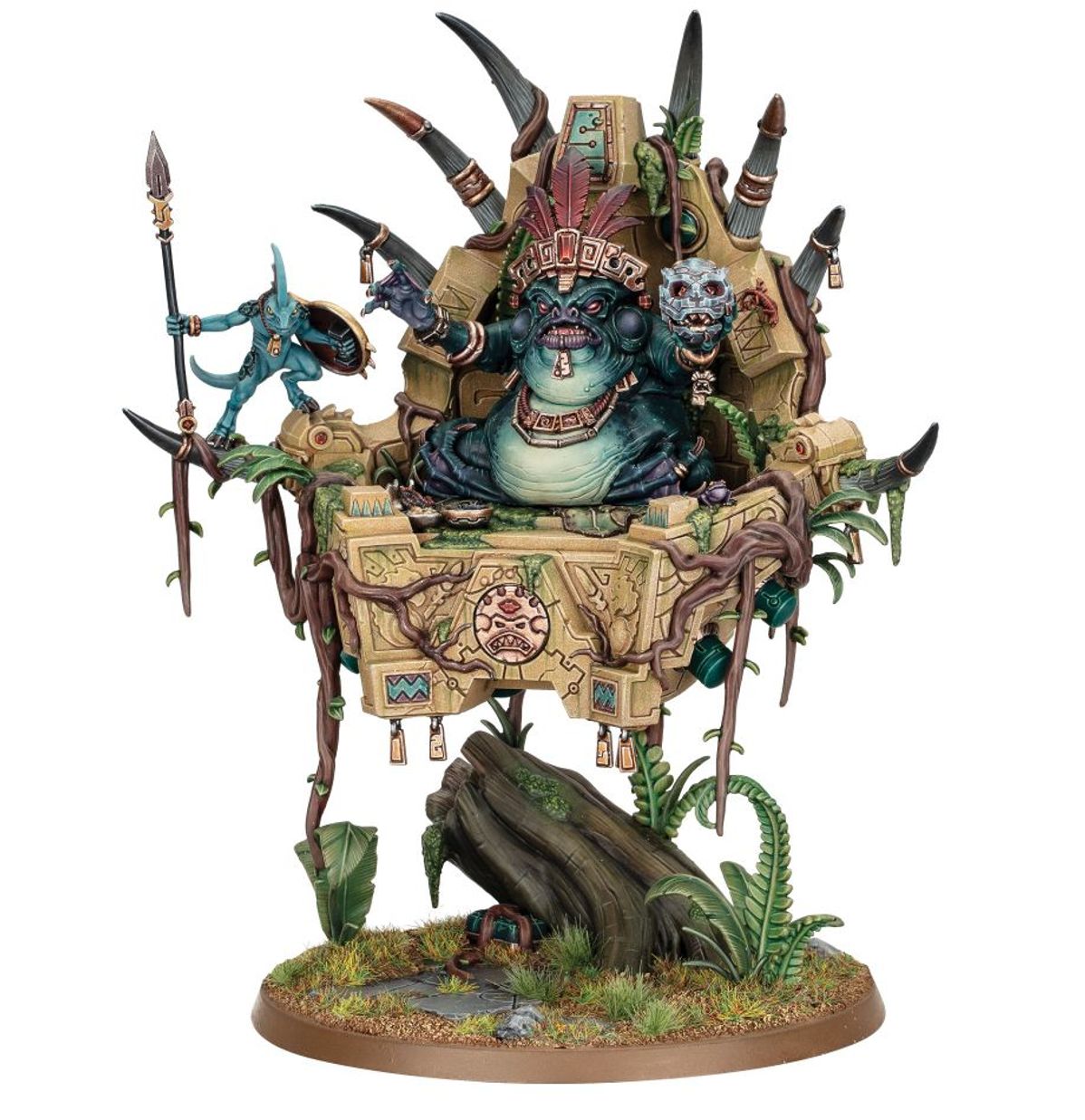 Slann Starmaster wariant 2 - ciemnozielona żaba-mag z pióropuszem i srebrną czaszką w dłoni na beżowej palankinie z brązowymi korzeniami, niebieski Skink ze włócznią po lewej - Warhammer Age of Sigmar
