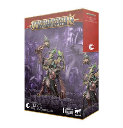 Trugg the Troggoth King - pudełko Warhammer Age of Sigmar Gloomspite Gitz czerwono-złote 1 Citadel Miniature troll z maczugą i zielonym artefaktem fioletowe tło Games Workshop