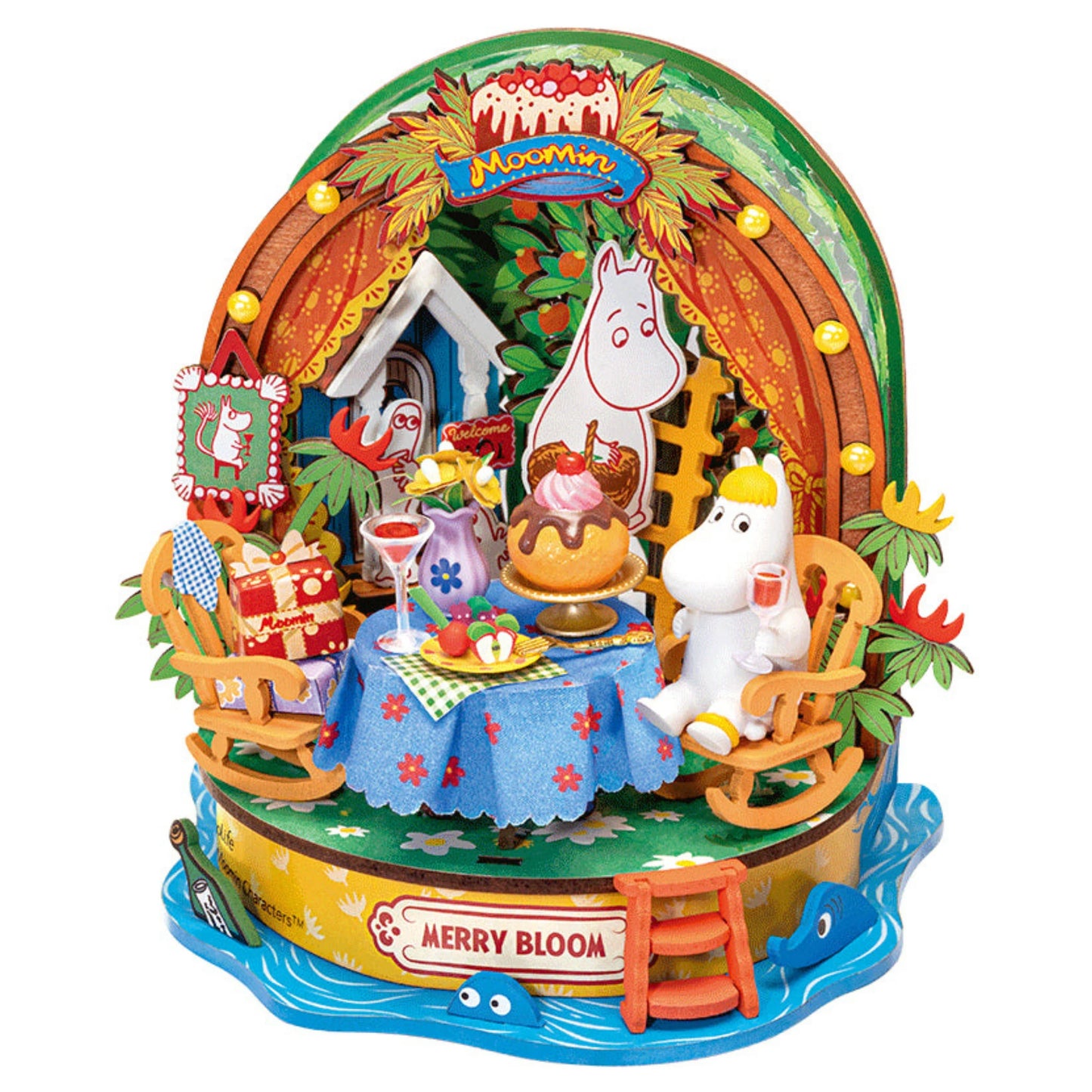 Ogrodowe Przyjęcie Panny Migotki Rolife DA011 – gotowy model miniaturowego domku Muminki z Panną Migotką przy stole, widok frontalny