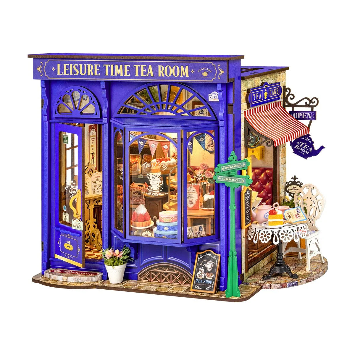 Herbaciarnia Leisure Time Tea Room Rolife DG171 – gotowy model z niebieską fasadą i ogrodowym tarasem, widok frontalny na neutralnym tle