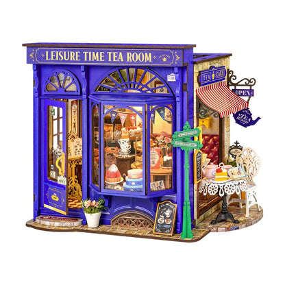 Herbaciarnia Leisure Time Tea Room Rolife DG171 – gotowy model z niebieską fasadą i ogrodowym tarasem, widok frontalny na neutralnym tle
