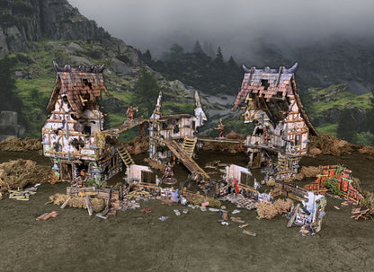 Village Ruins BSTFWE013 28-35mm Battle Systems - złożona sceneria ruiny wioski z figurkami widok z boku klimatyczne tło górskie
