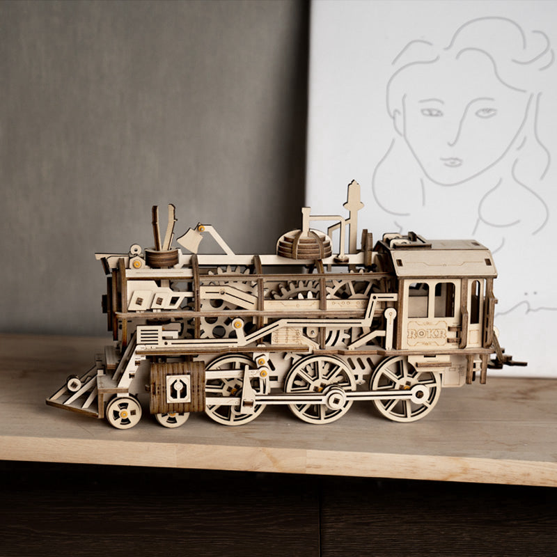 Lokomotywa Parowa ROKR LK701 – pudełko zestawu Locomotive Mechanical Gears: przód z ilustracją modelu, poziom ekspert i oznaczeniem Spring