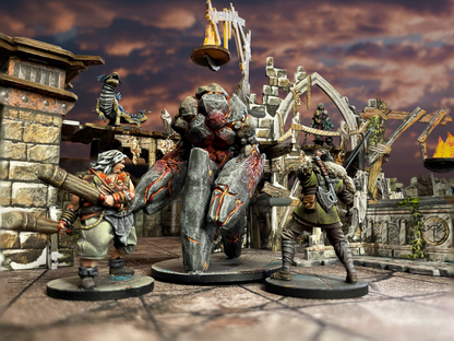 Maladum The Forbidden Creed – Maladite Golem atakowany przez Tilikeri the Mule i Numinora na podwyższonym chodniku fortecy, Reeki the Hunter i Kaan w tle
