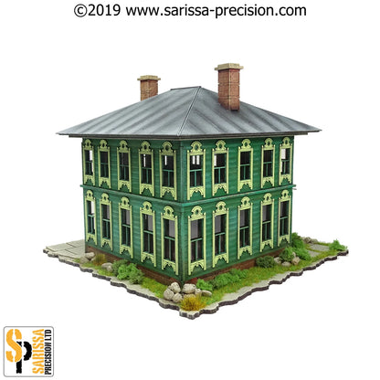 Russian Townhouse #1 N166 – widok izometryczny z tyłu z podstawą: narożny 2-piętrowy dom na szarej kamiennej podstawie z trawą, krzewami i kamieniami, 28mm Sarissa Precision
