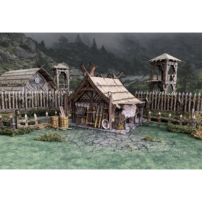 Northern Homestead BSTFWE019 28-35mm Battle Systems - złożona chata nordycka z ogrodzeniem i wieżą widok z boku klimatyczne tło leśne
