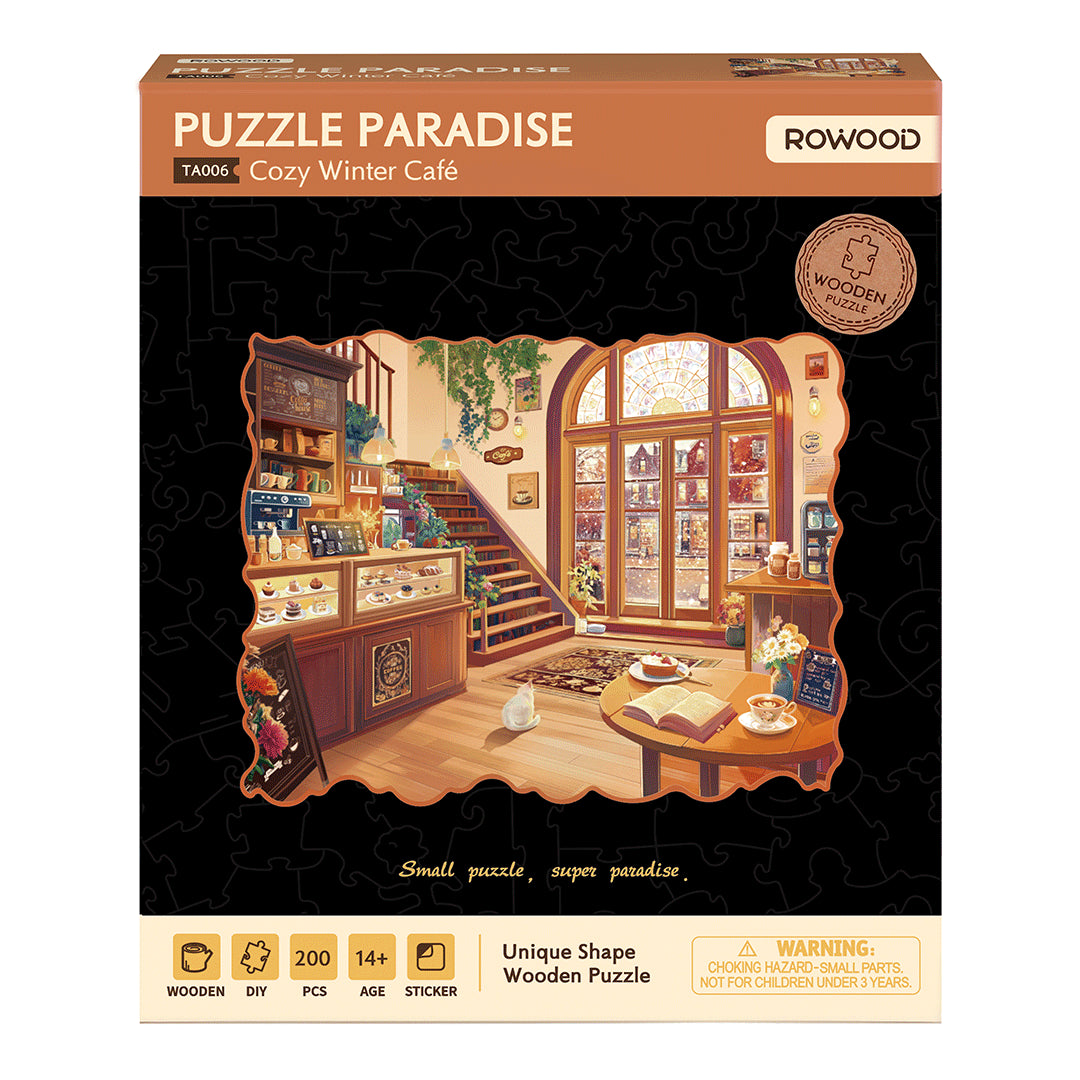 Przytulna Zimowa Kawiarnia Rowood TA006 Cozy Winter Café – pudełko zestawu Rowood Puzzle Paradise Cozy Winter Café TA006 na czarnym tle z ilustracją i oznaczeniem 200 elementów
