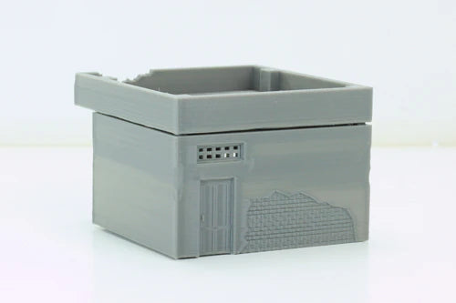 Arab Urban Building Workshop – widok z boku z kratą wentylacyjną i dużymi drzwiami, teren 28mm Patrick Miniatures
