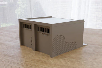 Power Substation – widok z boku z uszkodzoną ceglaną ścianą i oknami, teren 28mm Patrick Miniatures
