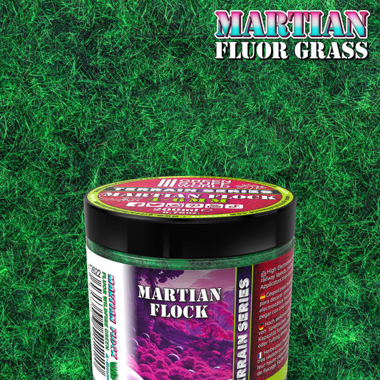 Martian Fluor Grass Wildfire Green 200ml Green Stuff World - słoik z fluorescencyjną trawą elektrostatyczną na tle trawy