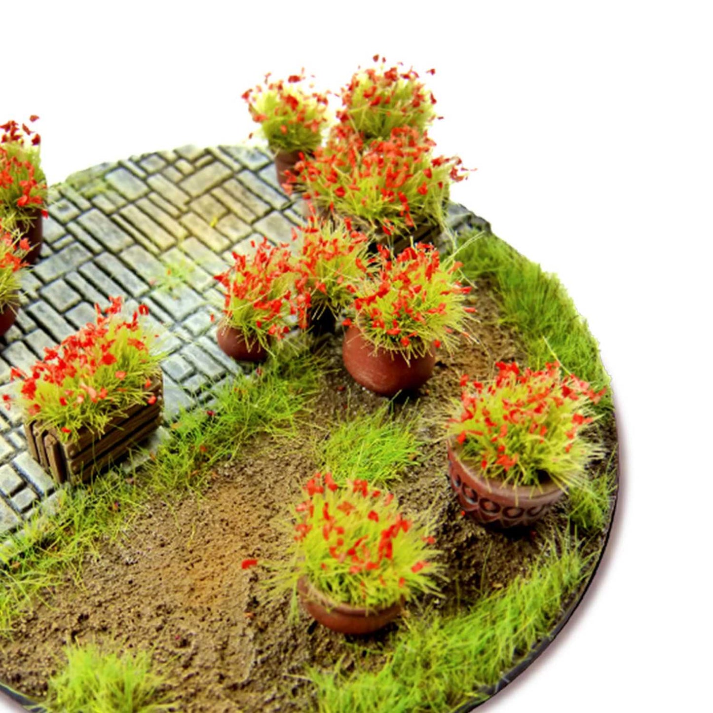 Shrub Tufts 6mm Red Green Stuff World - diorama z brukowaną ścieżką i krzewinkami z czerwonymi kwiatami na okrągłej podstawce
