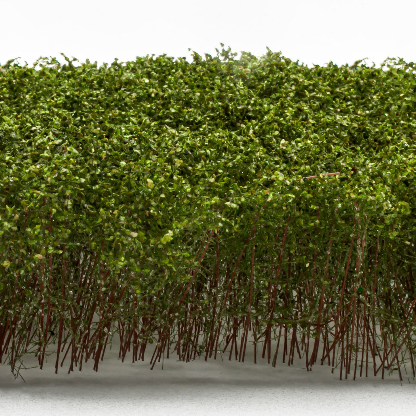Tall Shrubbery Light Green GSW - zbliżenie na gęste jasnozielone krzewy miniaturowe z syntetycznymi łodygami i liśćmi do dioram