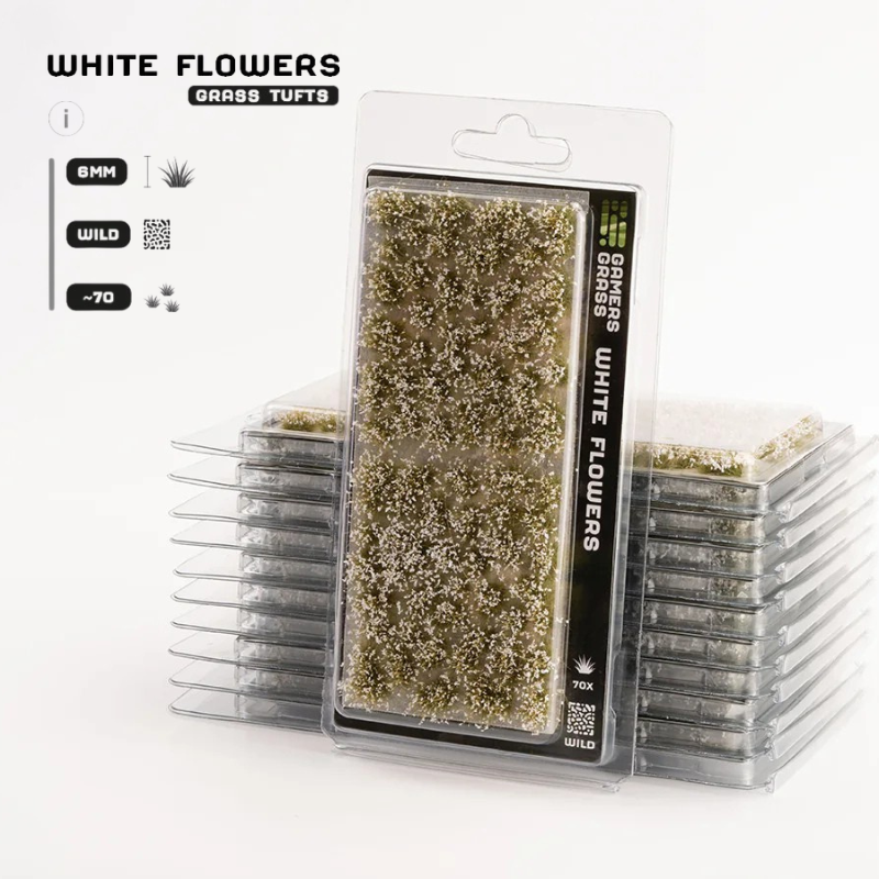 White Flowers 6mm Wild Gamers Grass - opakowanie blister ze stosem produktów, widok z przodu z arkuszem 70 śnieżnobiałych kępek kwiatowych i oznaczeniem 6mm Wild 70x

