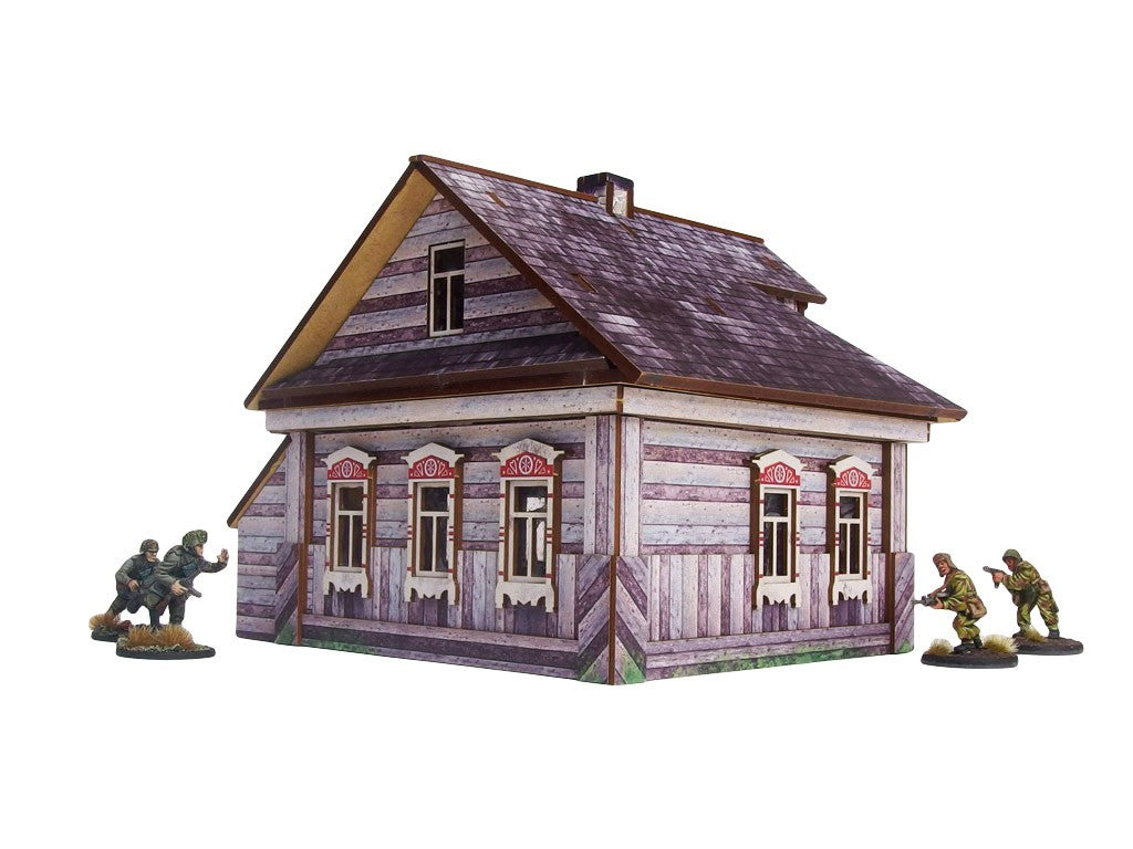 Ostfront Village Whitewashed Dacha – widok izometryczny na narożnik z pięcioma oknami i czerwonymi drzwiami, żołnierze po bokach, 28mm Bolt Action
