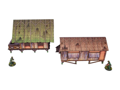 WW2 Pacific Jungle Huts (2) PREPAINTED – panele HDF z wyciętymi elementami obu chat dżunglowych przed montażem, widok zbliżony, UV-druk multicolor
