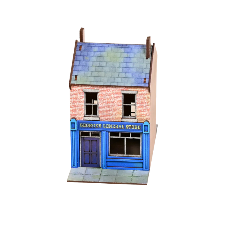 George's General Store GLA003 – widok izometryczny z przodu na 2-piętrowy budynek z niebieską fasadą sklepu, szyldem "George's General Store" i dachem łupkowym, MDF CMYK, 28mm Sarissa Precision
